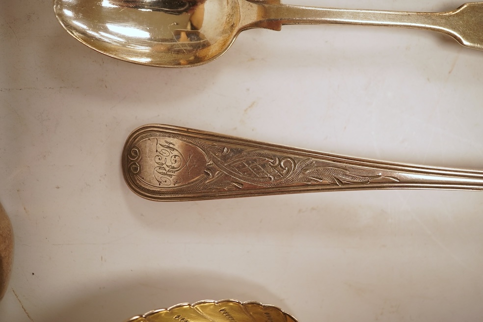 A pair of George III silver Old English pattern berry spoons, by Eley, Fearn & Chawner, London, 1810, 22.1cm, together with three Victorian silver fiddle pattern teaspoons, 6.8oz, together with a pair of plated sugar ton